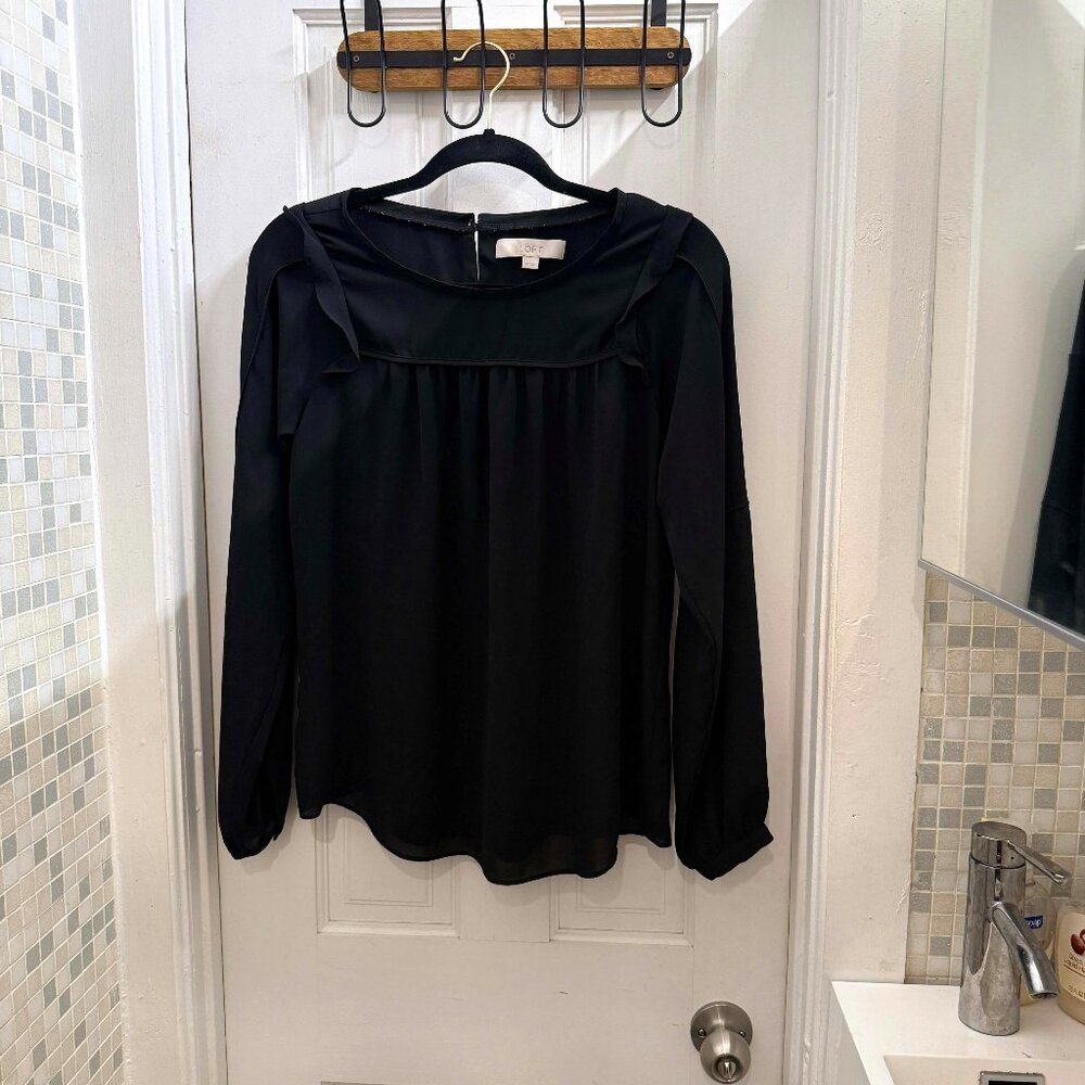 Ruffled sleeve black blouse